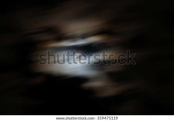 full moon with moving\
cloud.
