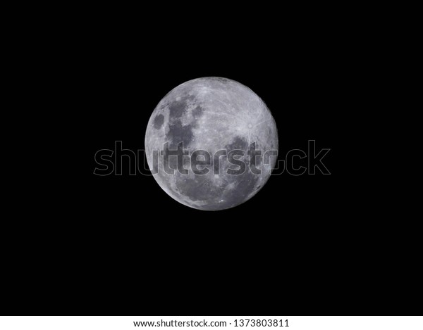 Full Moon Natural satellite orbiting the\
planet earth and its craters -\
\
Astronomy