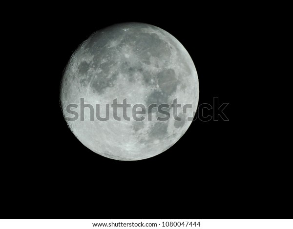 Full Moon at night / The Moon is an\
astronomical body that orbits planet Earth, and is Earth\'s only\
permanent natural\
satellite