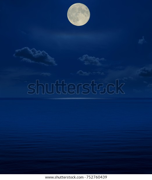 full moon in night over\
sea