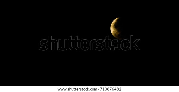 full moon at night with silhouette\
glass lawn.full moon background.\
moonlight in back background.\
close-up the moon in dark sky isolated wallpaper.\
half moon\
isolated style.with copy space and\
text.\
\
