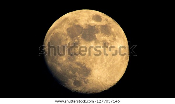 Full\
moon in the night sky. Moon on the black\
background