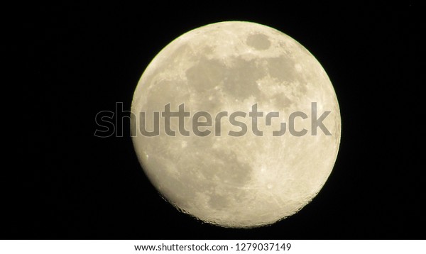 Full\
moon in the night sky. Moon on the black\
background