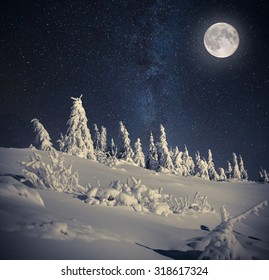 Full Moon In Night Sky In The Winter Mountains