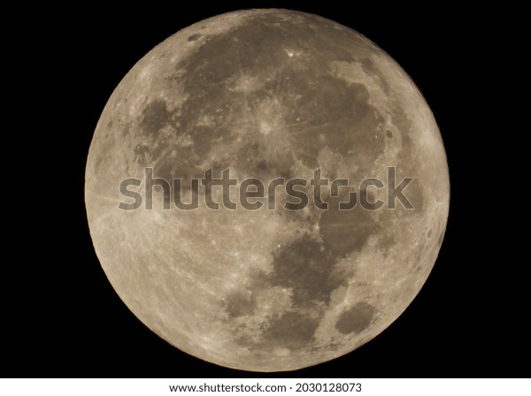           The full moon on a clear night,\
showing craters.