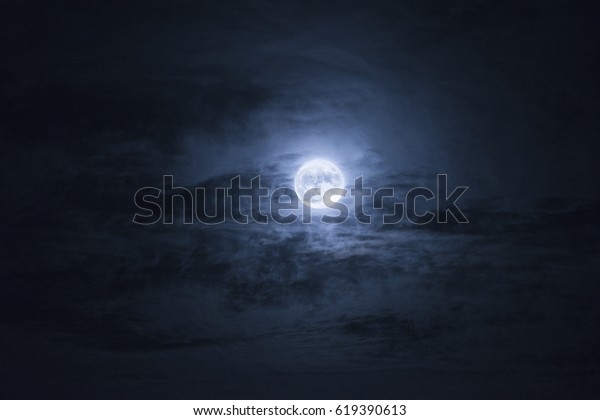 Full moon on a cloudy
night
