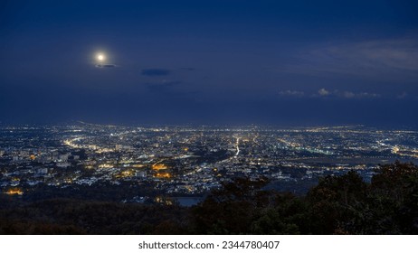 full moon over Chiang mai city at night, aerial view City night from the view point on top of mountain	 - Powered by Shutterstock