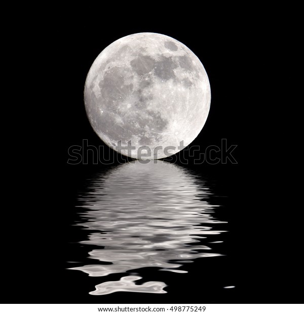 Full moon over cold night\
water