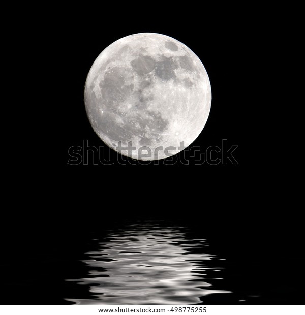 Full moon over cold night\
water