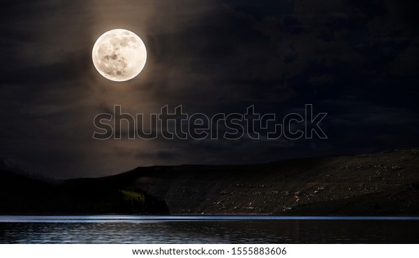 Full moon over the\
lake