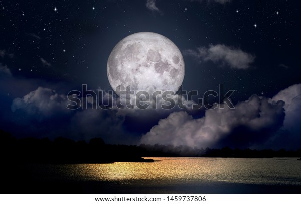 Full moon over the night\
lake