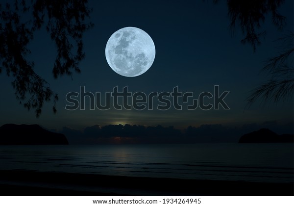 Full moon over sea in the
night.