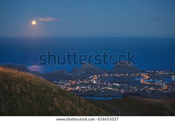 full moon over the\
sea, view from the hill