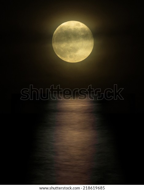 full moon with
reflection