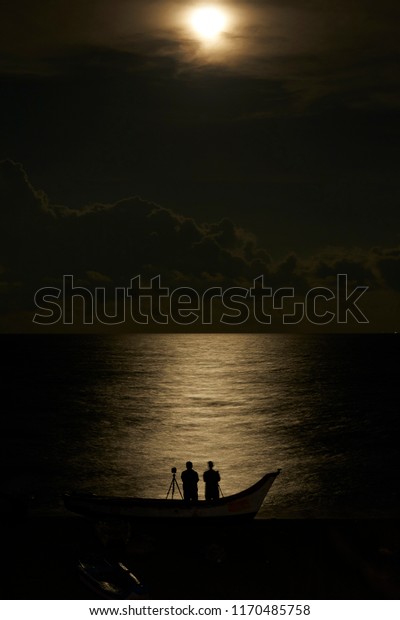 Full moon with reflection
in the sea