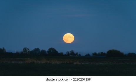 Full Moon Rise Up At Hansweert Zeeland, The Netherlands.