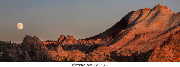 A Full Moon Rises Over The Kolob Terrace Area Of Zion National Park, Utah