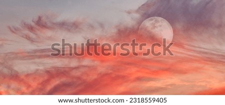 A Full Moon Is Rising In A Colorful Sunset Blue Daytime Sky Banner