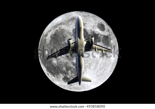 The full Moon is\
seen isolated on a black background. High contrast, high resolution\
image taken with a full frame dslr camera. Aairplane passing in\
front of the moon.