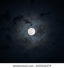 Full moon shining on cloudy Night sky background. Concept of Halloween, horror, mystic. Dramatic Dark spooky clouds around the moon. Earth satellite. Beauty in nature - Powered by Shutterstock