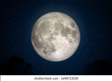Full Moon in space with dark cloud in night sky. (Elements of this image furnished by NASA.)