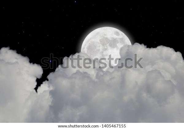Full\
moon with starry and clouds background. Dark night.\
