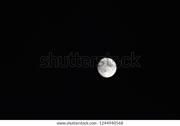 full moon in starry night sky
