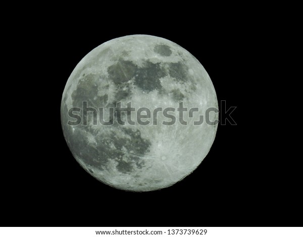 a full moon in the
starry night sky