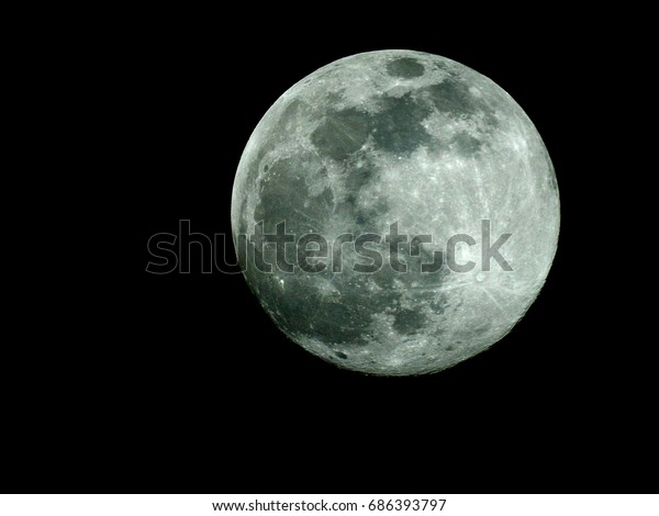 Full Moon or Super Moon / A full moon is the lunar phase\
that occurs when the Moon is completely illuminated as seen from\
Earth. 