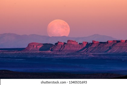 The full moon or supermoon rises over Monument Valley on Navajo Tribal Land on the Utah/Arizona border.
