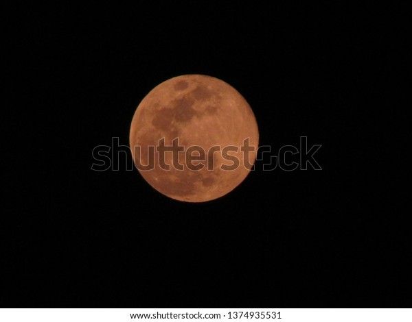 Full pink moon in the night sky, India,
big full pink moon on Friday, close up of moon
