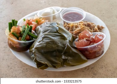 Full Plate Of Local Style Lunch In Hawaii With Fish, Poi, Vegetables, Coconut Haupia From Food Truck.