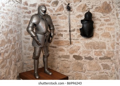 Full Plate Protective Armor And Sword Of Medieval Warrior