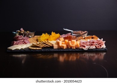 Full Platter Of Meats, Cheese, Nuts, Crackers And An Apricots Spread. 