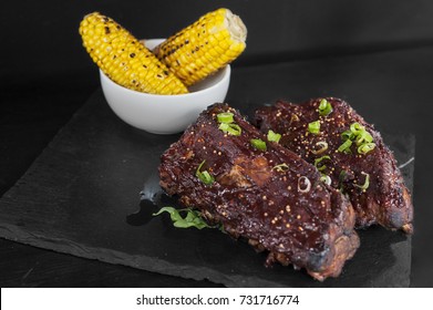 Full Rack Of Ribs And Corn On Cob