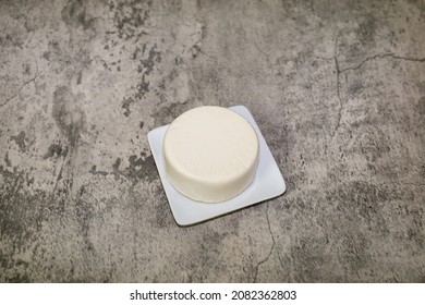 A Full Round Wheel Of Queso Fresco Also Known As Queso Blanco Or Fresh Cheese.