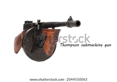 Full scale model of a Thompson submachine gun isolated on white with sample text.