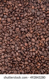 full screen coffee bean background, lots of brown coffee beans, coffee theme for coffee shop, cozy background