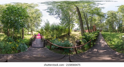 Full seamless 360 degree HDRI spherical panorama wooden walkway through the forest park, sunny weather