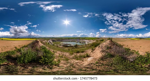 full seamless hdri panorama 360 degrees angle view near quarry flooded with water for sand extraction mining in sunny day with clear sky in equirectangular spherical projection for VR AR content