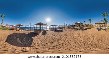 full seamless spherical hdr 360 panorama view on coast of sea with wooden beach umbrellas and sun loungers by red sea in bright sunny day in equirectangular projection, ready for VR AR virtual reality
