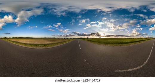 full seamless spherical hdri 360 panorama view on no traffic asphault road among fields with evening sky and clouds in equirectangular projection,can be used as replacement for sky in panoramas