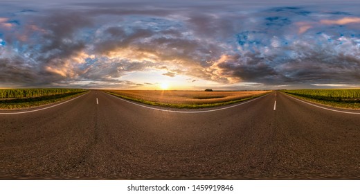 full seamless spherical hdri panorama 360 degrees angle view on asphalt road among fields in summer evening sunset with awesome clouds in equirectangular projection, ready for VR AR virtual reality