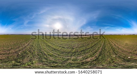 Similar – Sommer August Feld zur Erntezeit bei Sonnenuntergang Sonnenlicht