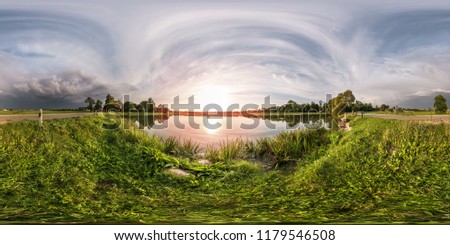 full seamless spherical panorama 360 by 180 angle view on the shore of lake in evening before storm in equirectangular projection, ready VR virtual reality content with complete zenith