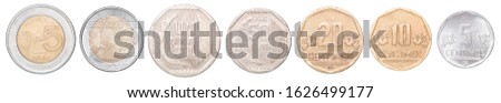 Full set of Peruvian coins in a row isolated on white background.