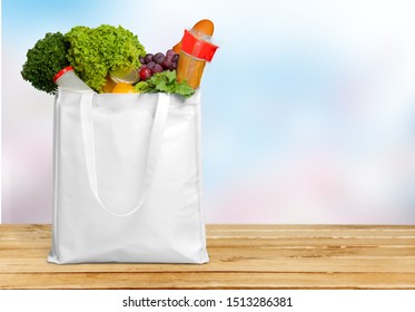 Full Shopping Bag On Desk Stock Photo (Edit Now) 1162999096