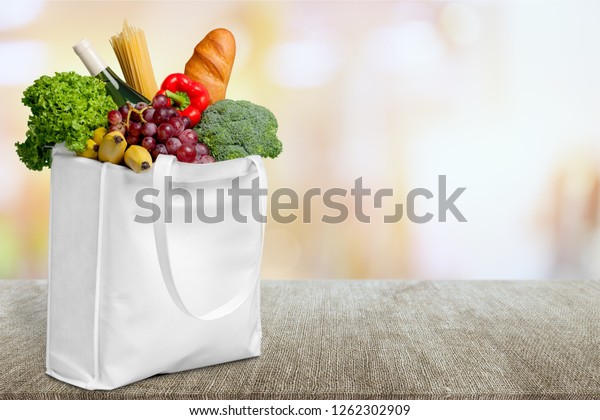 Full Shopping Bag Isolated Over Background Stock Photo (Edit Now