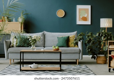 Full shot of snug living room with pastel shades and cozy eco friendly furniture and decor, copy space - Powered by Shutterstock