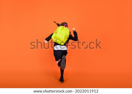 Similar – Image, Stock Photo Anonymous woman with backpack in boarding bridge